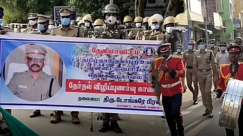 நகர்ப்புற உள்ளாட்சி தேர்தல்: பெரியகுளத்தில் காவல்துறையினர் விழிப்புணர்வு அணிவகுப்பு பேரணி