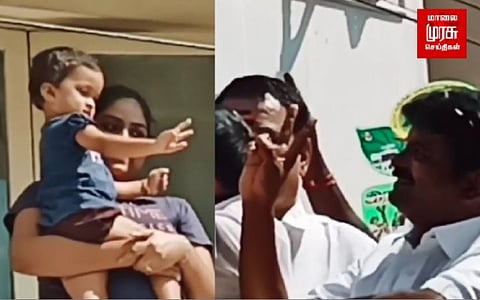 வாக்கு சேகரிப்பின் போது...இரட்டை இலை சின்னத்தை காட்டிய குழந்தை...!