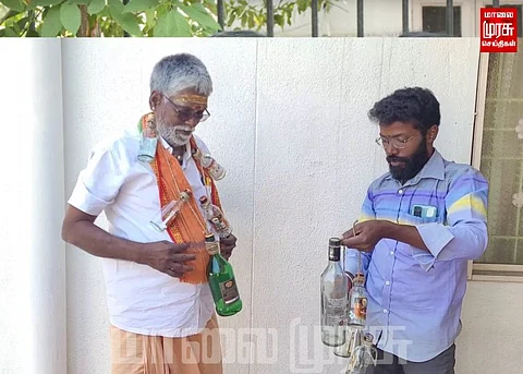 கழுத்தில் காலி பாட்டில்களை மாட்டிக் கொண்டு நூதன முறையில் மனு கொடுத்த பாஜக-வினர்...