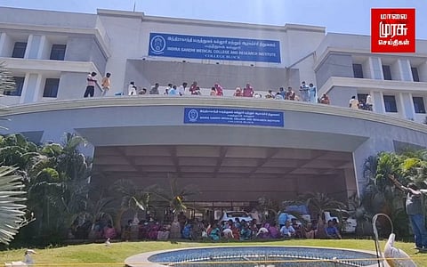 மருத்துவமனை கட்டிடத்தில் ஏறி ஊழியர்கள் போராட்டம்...புதுச்சேரியில் பரபரப்பு!