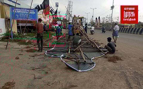 காற்றில் சரிந்த கலைஞர் கட் அவுட்; இரு சக்கர வாகன ஓட்டி மீது விழுந்ததா?