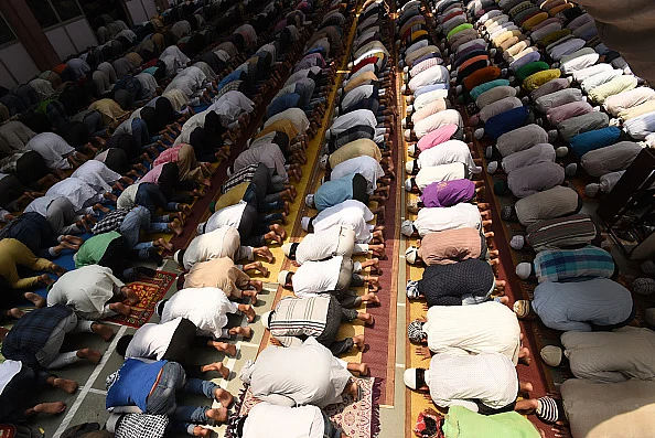 Muslims offering <i>namaz</i> at sector 8 Masjid, on 23 June 2017 in Noida. Picture for representation