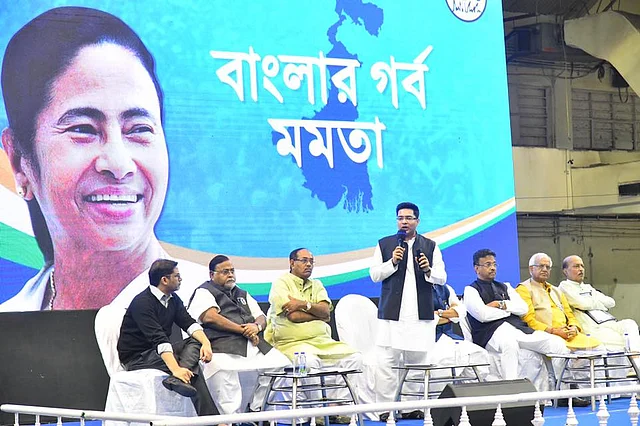 Abhishek Banerjee speaking at a Trinamool event while Prashant Kishor (extreme left) looks on. (Facebook)