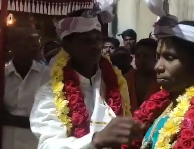 The Indra couple marry with royal regalia of white-ceremonial umbrella reserved traditionally for kings and deities.