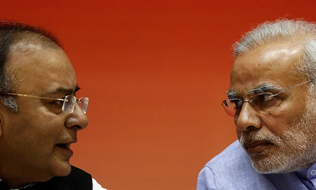 Finance Minister Arun Jaitley with Prime Minister Narendra Modi (right). (Photo: <b>The Quint</b>)