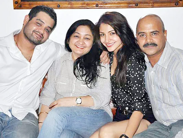 Anushka with her parents and brother
