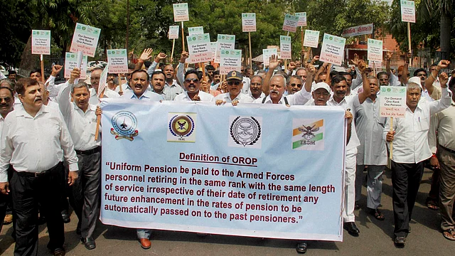 Ex-servicemen of Gujarat protest to demand “One Rank One Pension” in Ahmedabad on Sunday. (Photo: PTI)