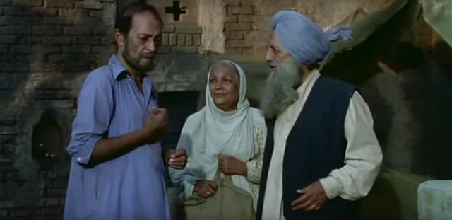 Iftekhar, Bhisham Sahni and Dina Pathak in a scene from <i>Tamas</i>