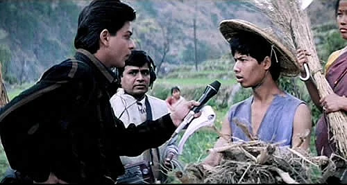 Shah Rukh Khan in a scene with tribals from Mani Ratnam’s <i>Dil Se</i>