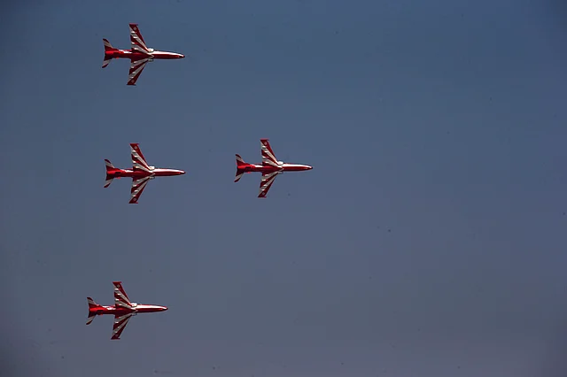 Indian Air Force Suryakirans comprising four Hawks fly in a formation during the Air Force Day parade. (Photo: AP)