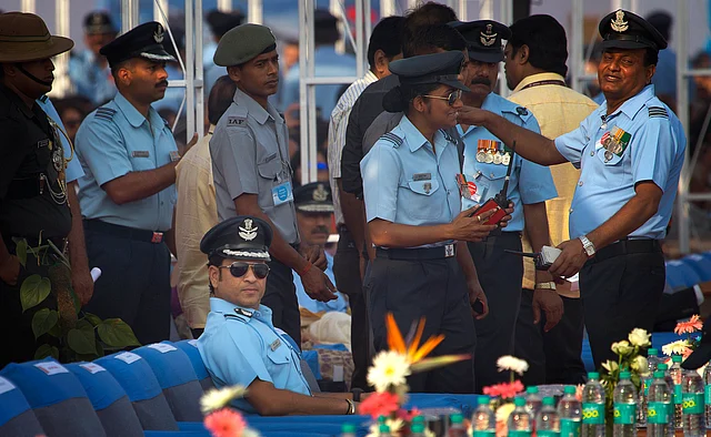 Former Indian cricketer and honorary Indian Air Force officer Sachin Tendulkar (seated) attends the Air Force Day parade at the Hindon Air Force base near New Delhi. (Photo: AP)