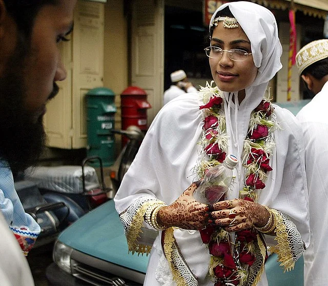 A bride in a traditional attire after participating in a mass wedding ceremony of the Dawoodi Bohra community. (Photo: Reuters) 