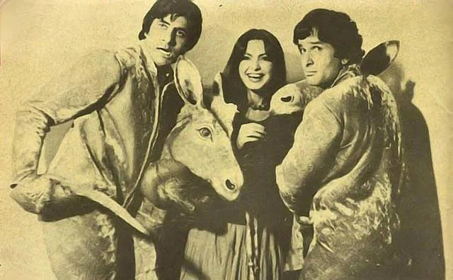 Amitabh Bachchan, Parveen Babi and Shashi Kapoor goof around on a film set. 