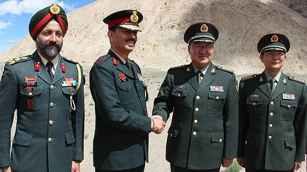 Chinese military delegation greets Indian army officials on Independence Day during a special Border Personnel Meeting at Chushul in Eastern Ladakh on 15 August 2015. (Photo: IANS)