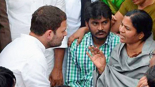 Rahul Gandhi with Rohith Vemula’s mother. (Photo: PTI)