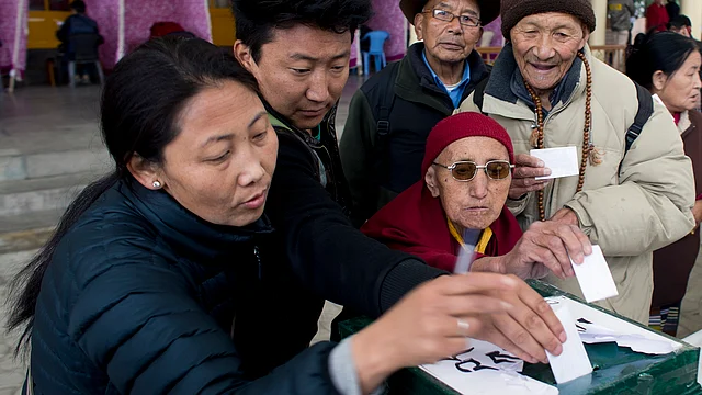 Exiled Tibetans cast their vote to elect the next prime
minister-in-exile in Dharamsala. 
