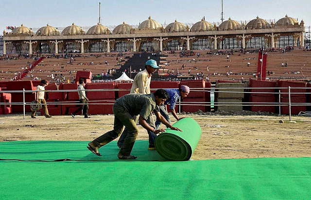 Workers prepare the venue (Photo: Reuters)