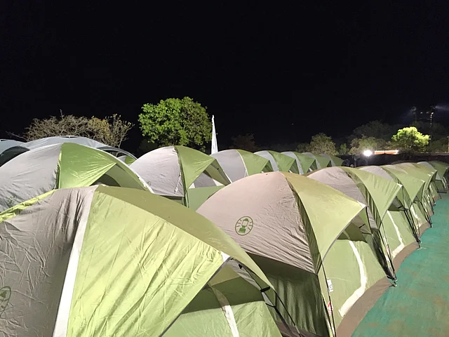 My humble abode for the night was a campsite with over 70 green tents – pitched side by side in a large compound. (Photo Courtesy: Radhika Sharma)
