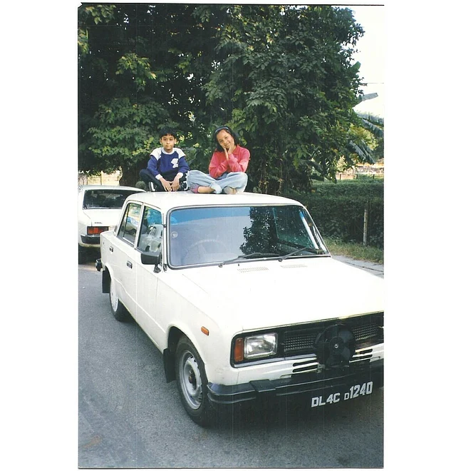 My friend and her brother. A picture from the early 90’s. A great spectacle was made of this setting, trying to get the best shot of the kids on an outing.