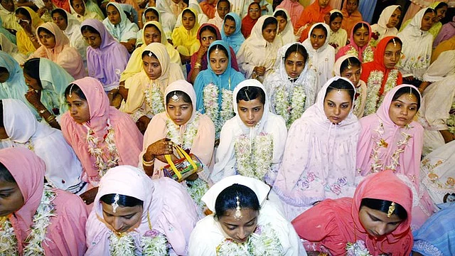 Women of the Dawoodi Bohra Muslim sect during a mass marriage function in Mumbai. The Dawoodi Bohra sect still carries out female genital mutilation (Photo: Reuters)