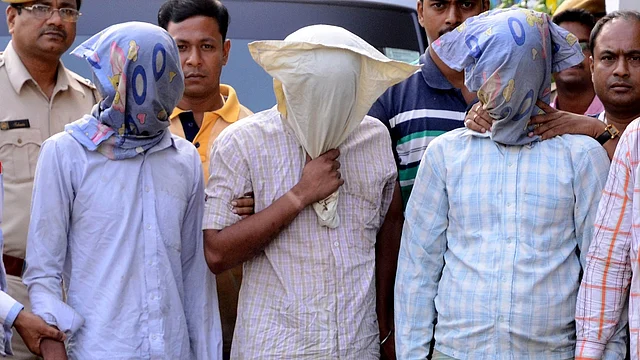 Police present before the media three persons allegedly involved in raping a 25-year-old woman in Kolkata’s Salt Lake, May 31, 2016. (Photo: Kuntal Chakrabarty/IANS)