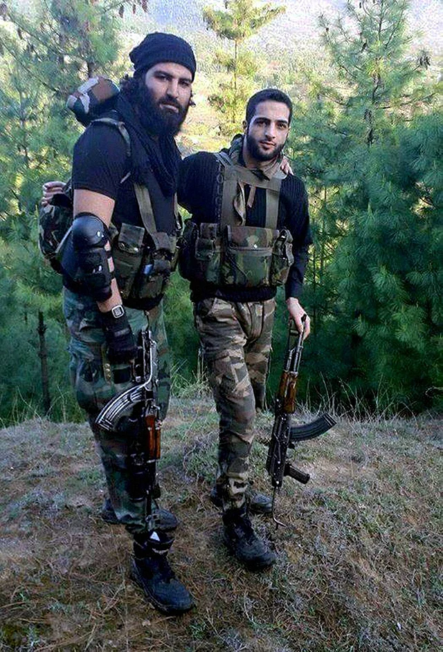 File photo of Burhan Wani (right), a 21-yr-old commander of the Hizbul Mujahideen. (Photo: PTI)