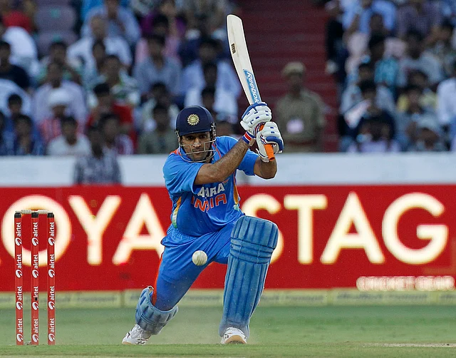 MS Dhoni hits a shot during the first one-day international match against England. (Photo: Reuters)