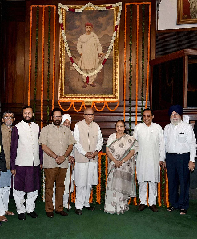 Sumitra Mahajan, Mukhtar Abbas Naqvi, Prakash Javadekar , Santosh Gangwar, SS Ahluwalia, LK Advani and Subramanian Swamy paying tribute to Lokmanya Bal Gangadhar Tilak on his birth anniversary at Parliament in New Delhi. 