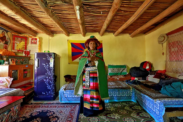 Testing Yangchan, 60, a housewife, poses for a photograph in Choklamsar, a village nestled high in the Indian Himalayas. (Photo: Cathal McNaughton)
