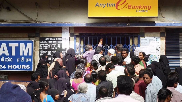 People queue up outside a bank in Hyderabad on 29 November 2016. (Photo: IANS)