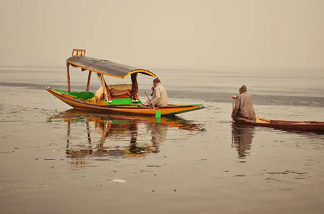 Two old man sailing Shikaras on Dal Lake on New Year day expecting locals to come out for a ride. Kashmir has lost its tourist season to unrest post a young militant leader Burhan’s encounter.