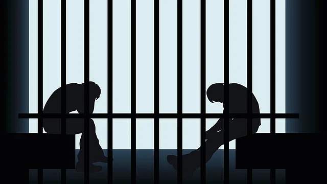 Representational image of jail and inmates.