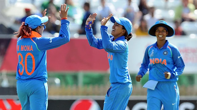 Ekta Bisht (middle) celebrates with her teammates after taking Pakistan’s Diana Baig’s wicket during the ICC Women’s World Cup. 