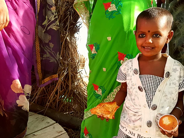4-year-old Sanjana strikes a pose.
