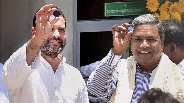 Rahul Gandhi and Siddaramaiah at the inauguration of ‘Indira Canteen’ in Bengaluru on Wednesday.