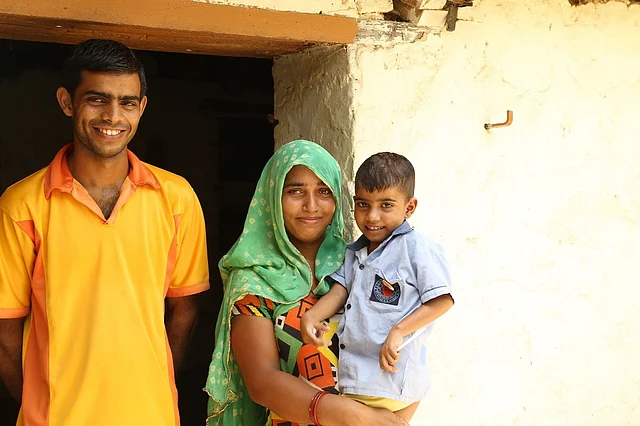 Anjali with her parents Anil and Aman.