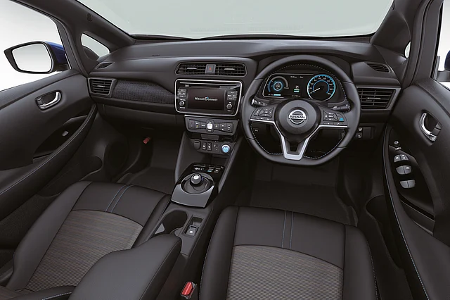 The Nissan Leaf has a fairly conventional interior with an LCD instrument panel. 
