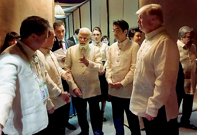 PM Modi with Donald Trump and Shinzo Abe at the ASEAN Summit dinner in Manila.