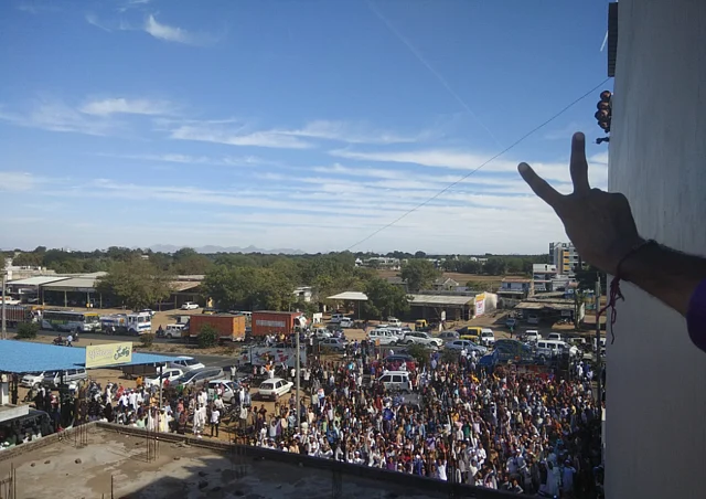 Jignesh Mevani makes the victory sign after his win in Vadgam, Gujarat.