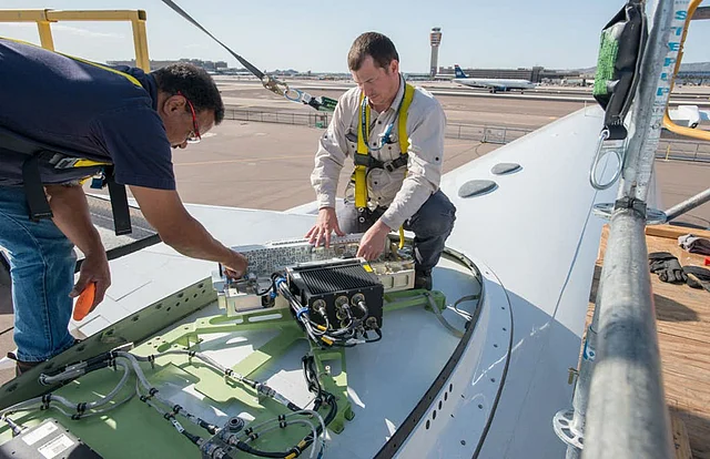 The WiFi transmitter fits right on top of the airline and adds to the weight of the plane. 