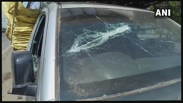 A car’s windshield which was destroyed by protesters in Aurangabad. 