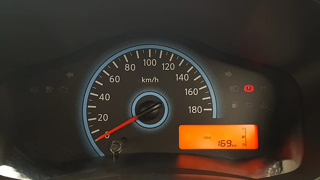 While driving you’ll see the gear switching on the left of the small orange-coloured screen. 