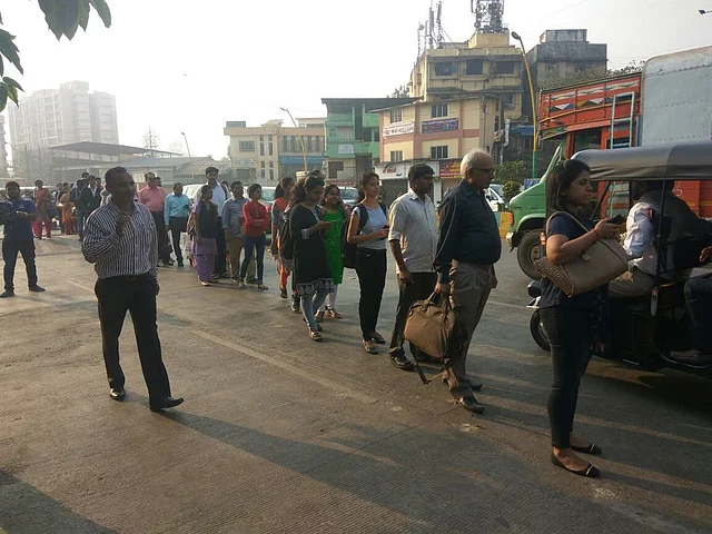 People seen waiting near Thane’s Vartak Nagar because of a lack of auto rickshaws and other transport in the state.