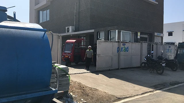 Although basic infrastructure is now available, water tankers are still being used by units such as this one in Sanand GIDC