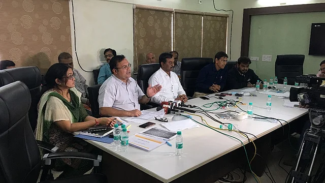 (Centre) Chintan Akhani, Divisional Manager, Ahmedabad, GIDC addresses the media on Friday, 9 February at Sanand GIDC office