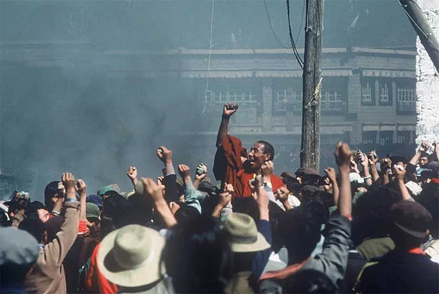 Tibetan monk Jampa Tenzin and protesters in Lhasa, Tibet in 1987 