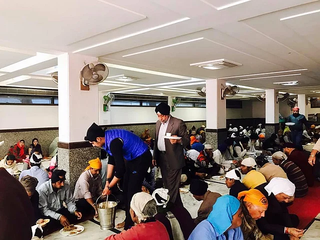 At a community Langar Seva at the Gurudwara.