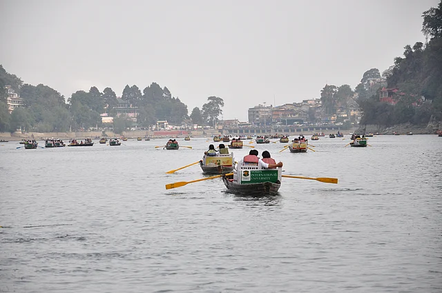 People enjoying boating in Naini Lake Nainital India.