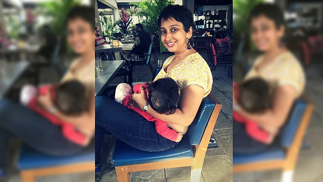 Adhunika with her younger child.
