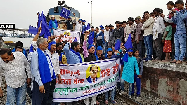 Protesters block a train in Bihar’s Arrah.